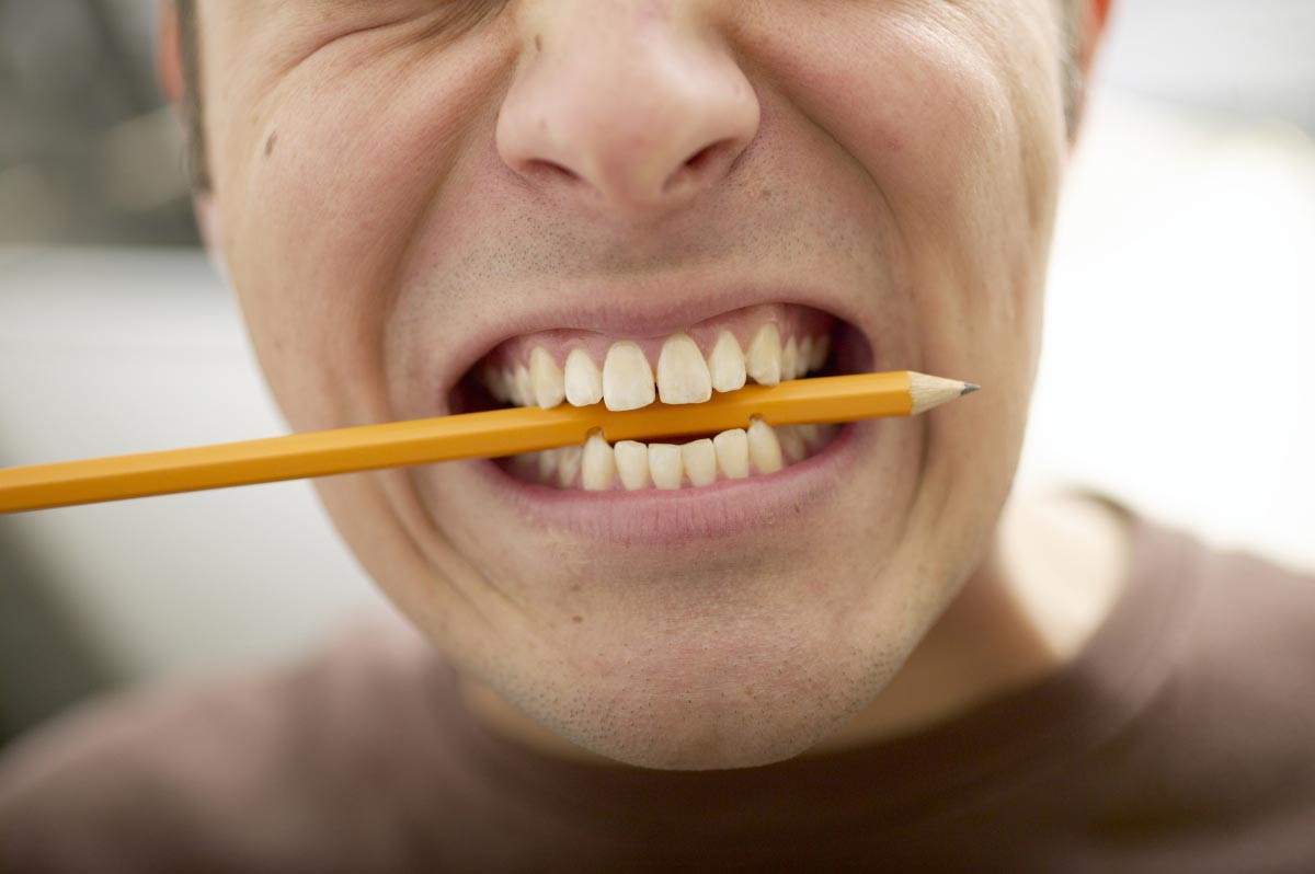 Teenager-Chew-Pencil-Teeth