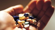 Hand-Holding-Medication-Prescription-Pills-Capsules